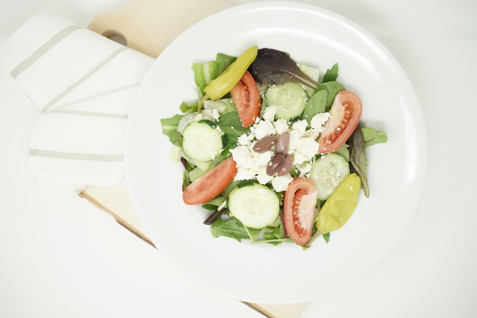 Order Greek Salad food online from Bellagio store, Farmingdale on bringmethat.com