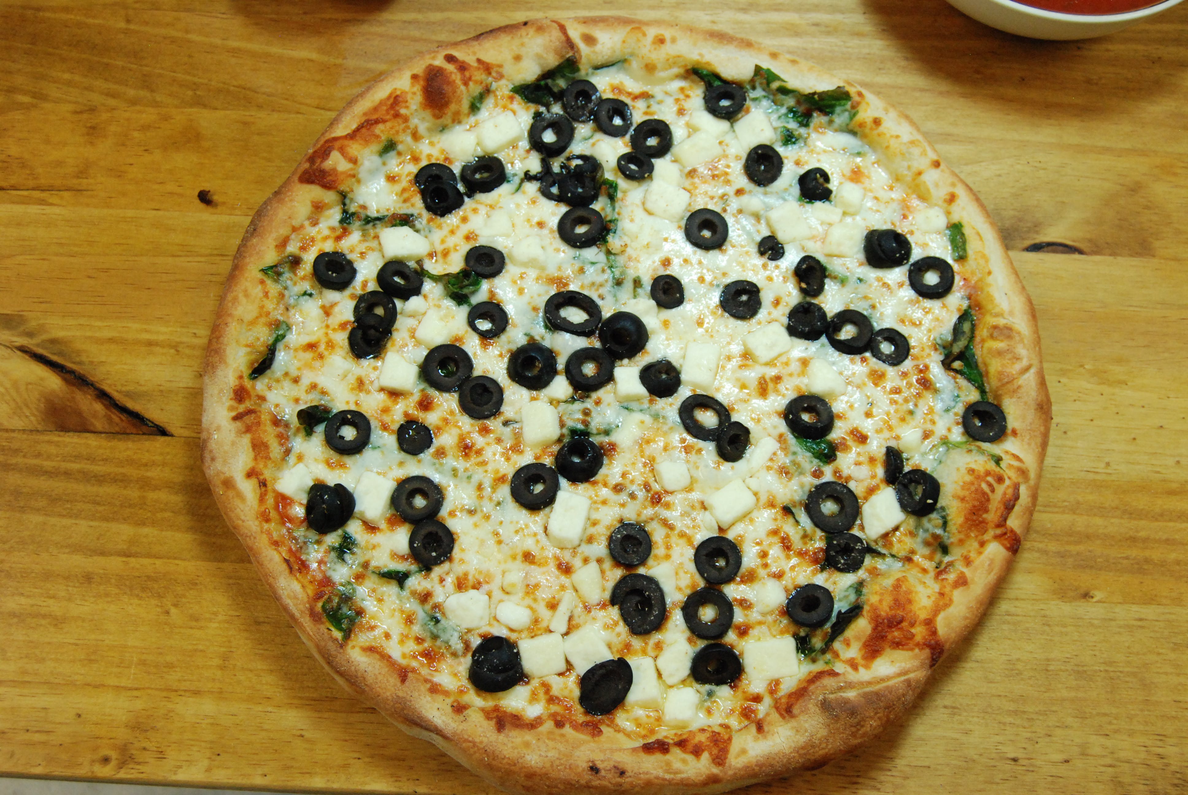 Order The Greek Pizza - Medium 12'' food online from Stefano's Pizza store, Novato on bringmethat.com
