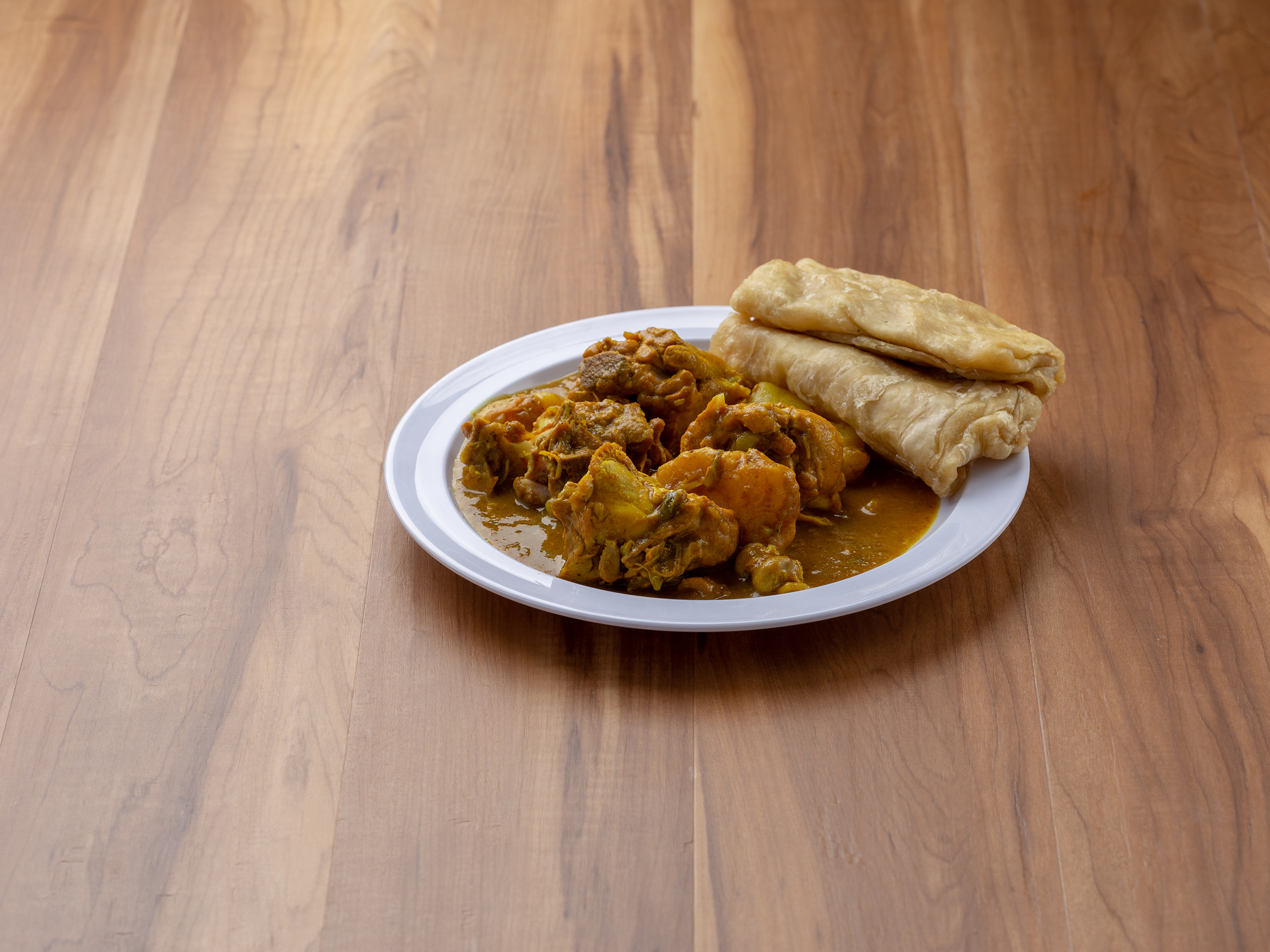 Order Curry Chicken Roti food online from Island Quizine store, Baltimore on bringmethat.com