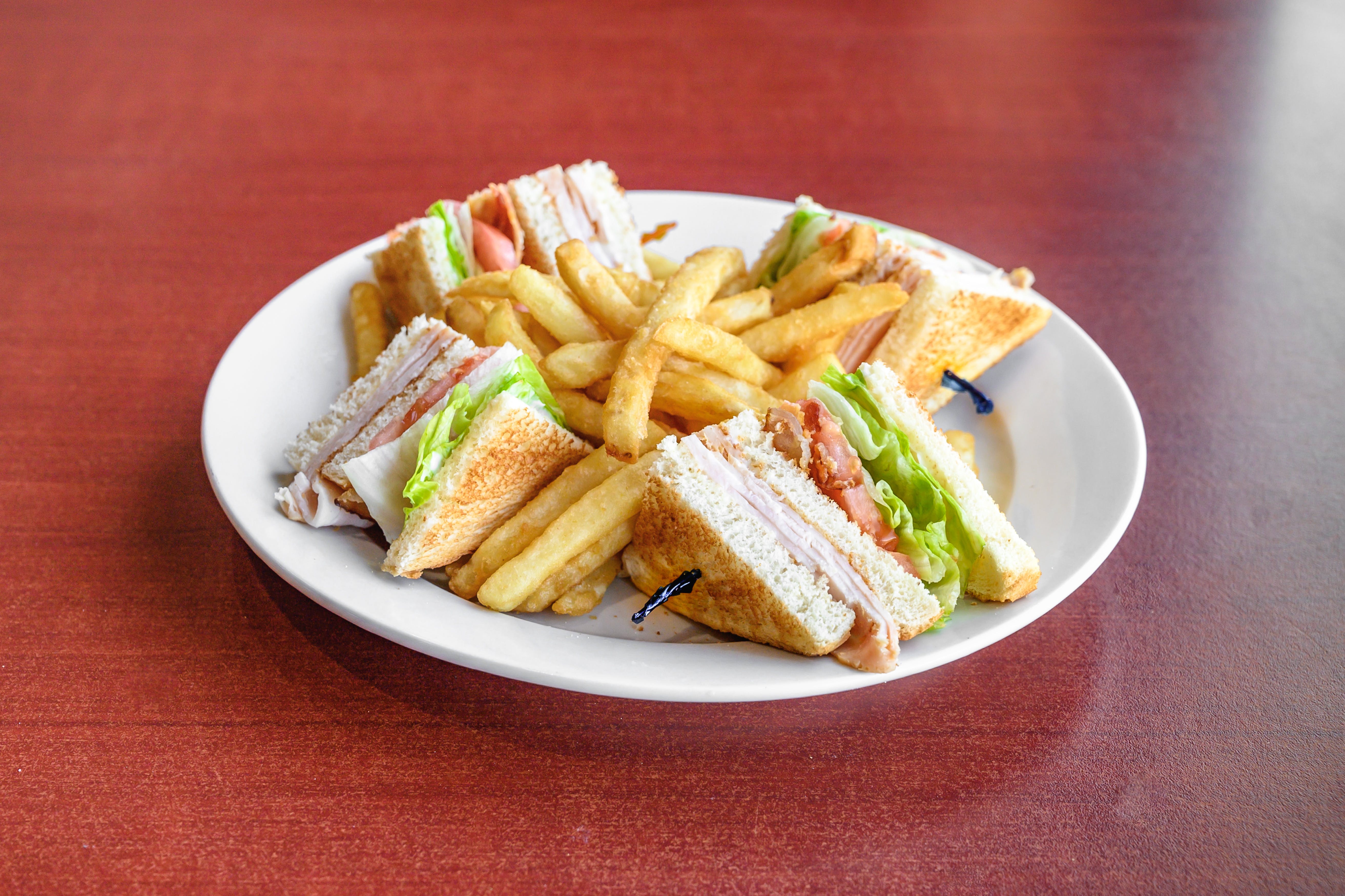 Order Turkey Club Sandwich - Sandwich food online from Methuen House of Pizza store, Methuen on bringmethat.com