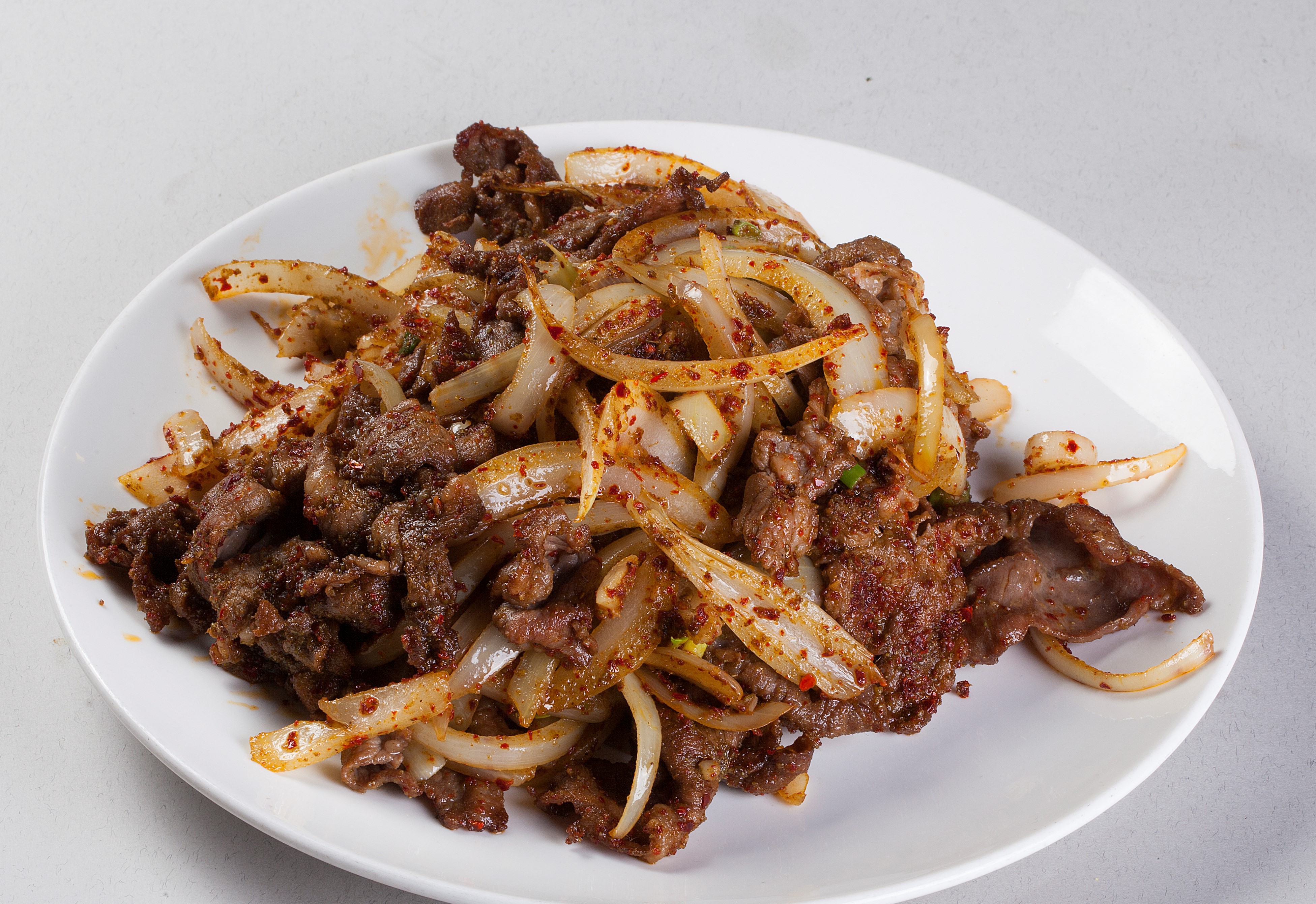 Order Stir-fried Lamb with Cumin food online from Canaan Restaurant Chinese Cuisine store, West Covina on bringmethat.com