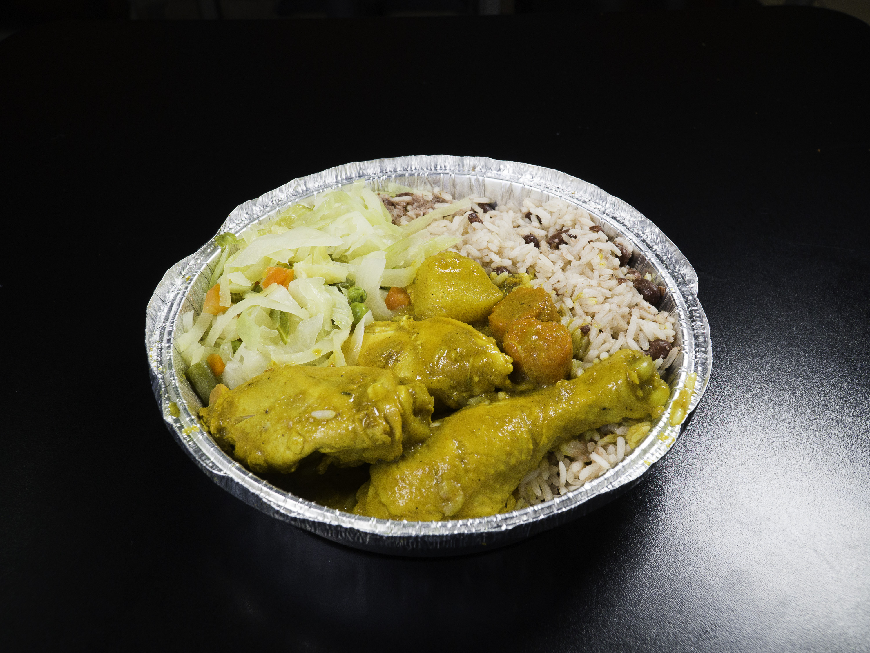 Order  Large Curried Chicken food online from Tropicana Eatery store, Silver Spring on bringmethat.com