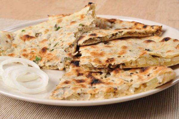 Order Onion Kulcha food online from Taste Of India store, Albuquerque on bringmethat.com