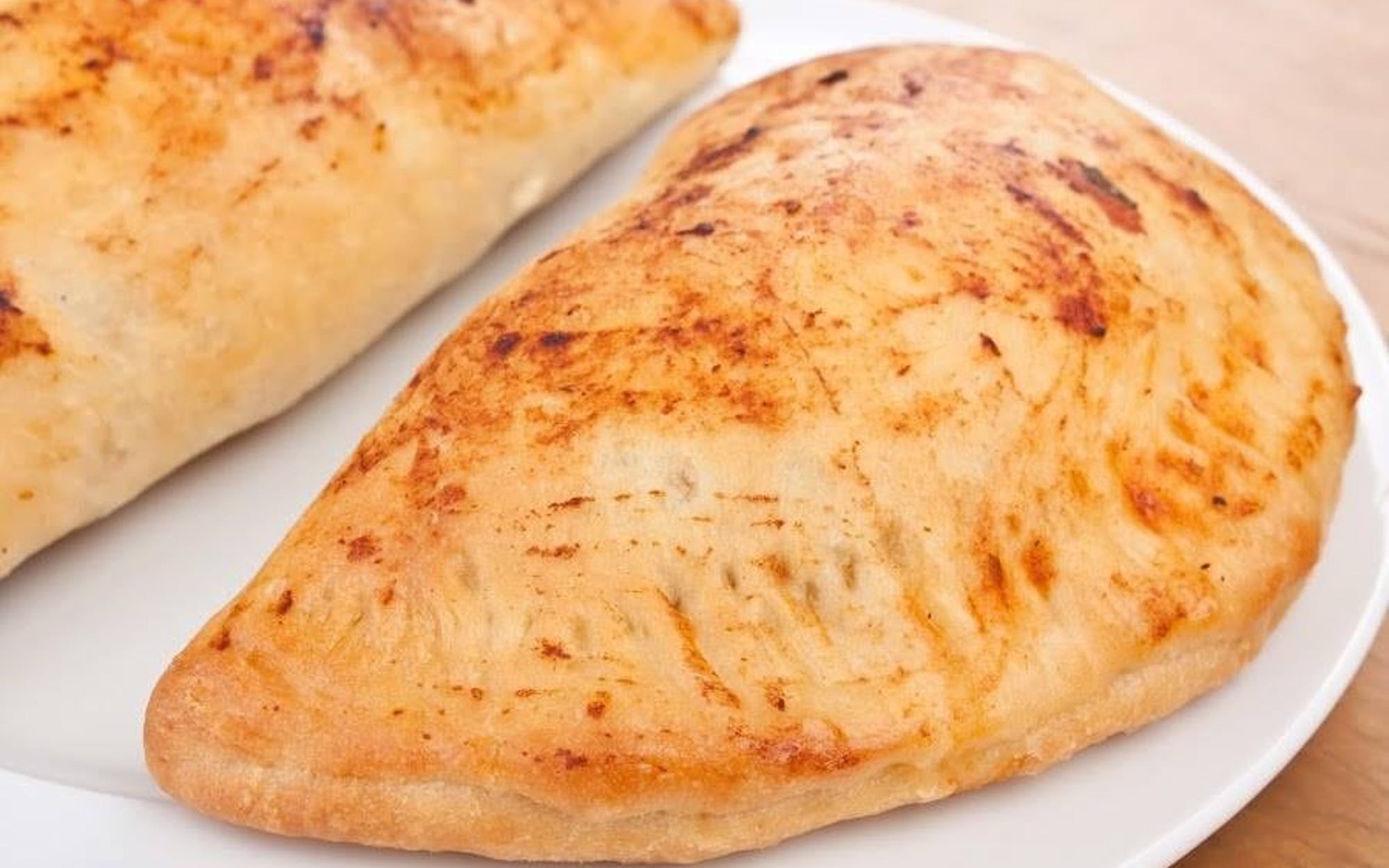 Order Cheese Calzone food online from Albie's Pizza store, Virginia Beach on bringmethat.com
