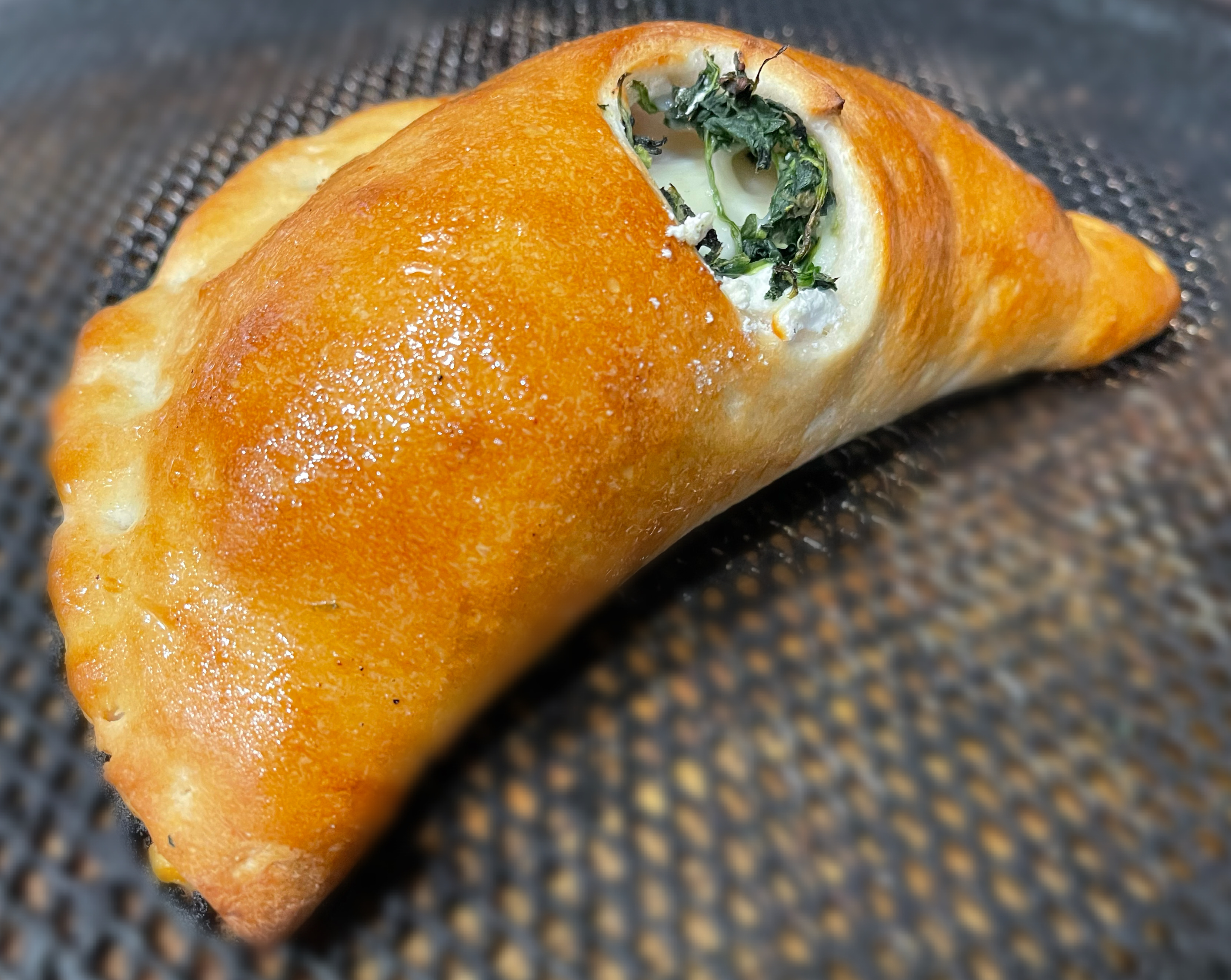 Order Spinach and Cheese Calzone food online from Famous famiglia pizza store, New York on bringmethat.com