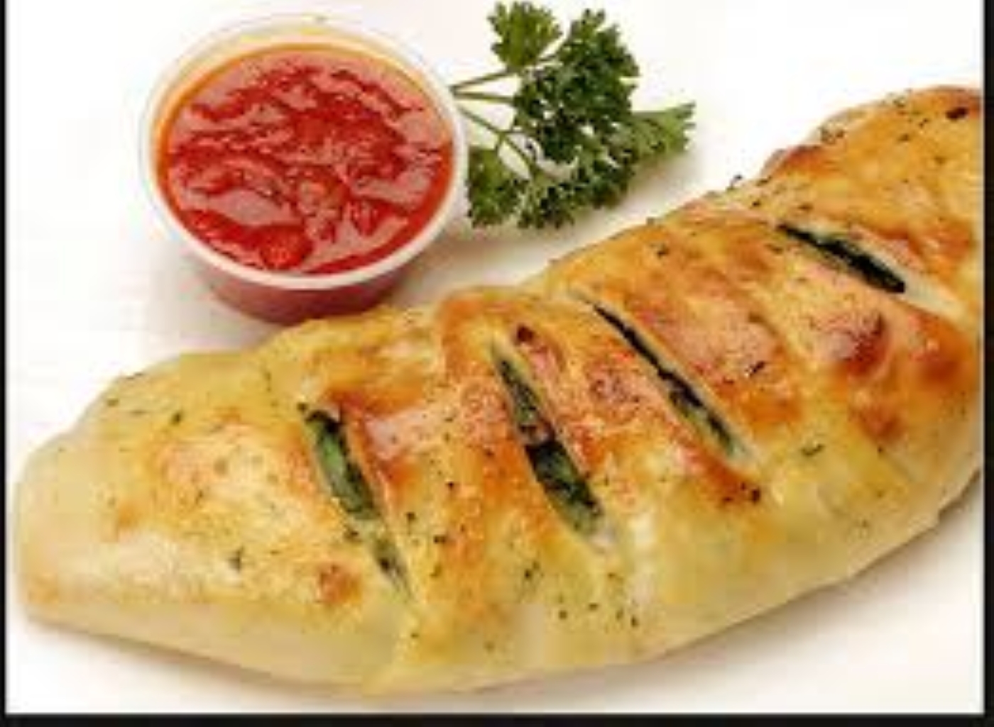 Order Spinach Calzone food online from Mega Pizza store, Raleigh on bringmethat.com