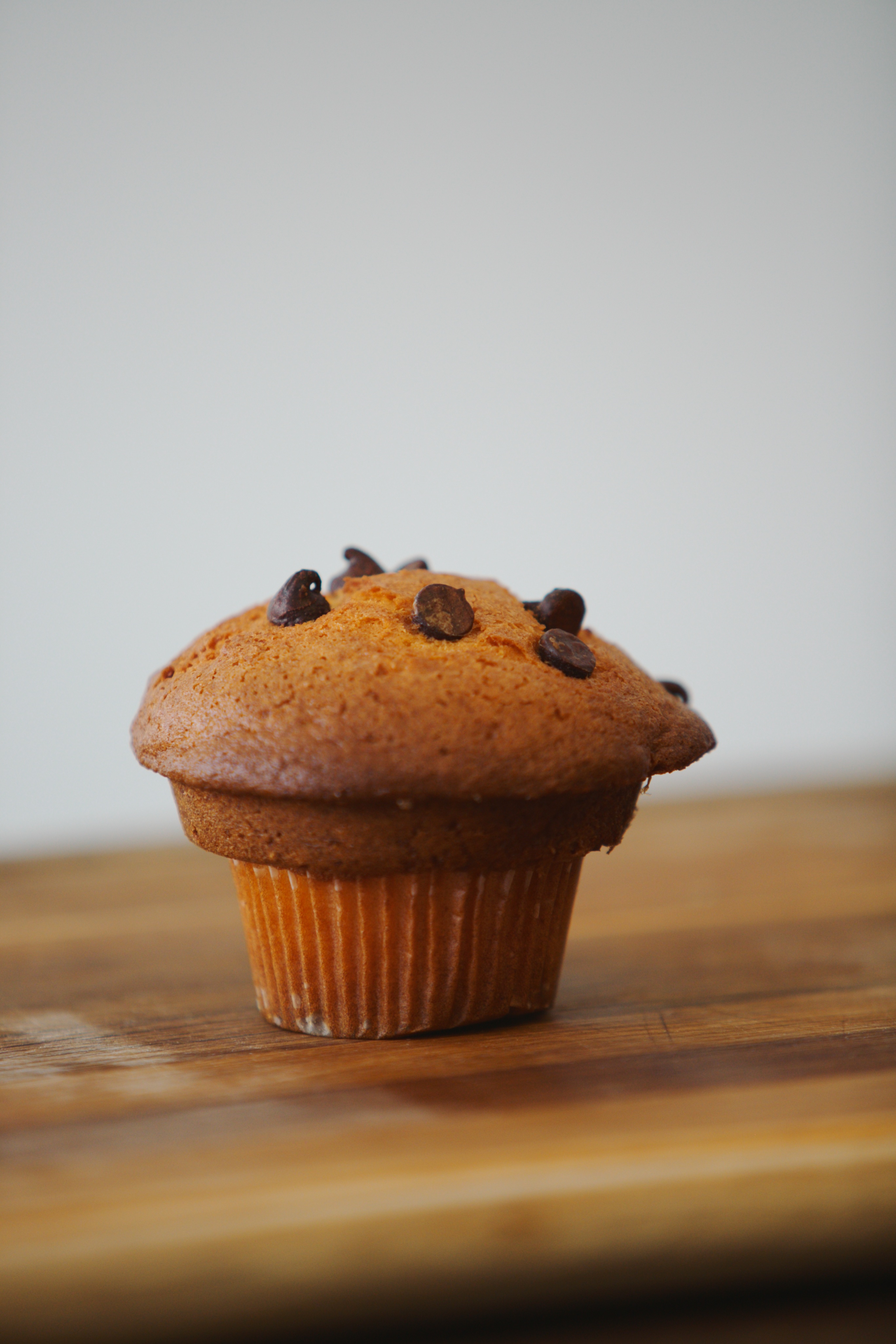 Order Chocolate Chip Muffin food online from Smile Donuts store, Hurst on bringmethat.com