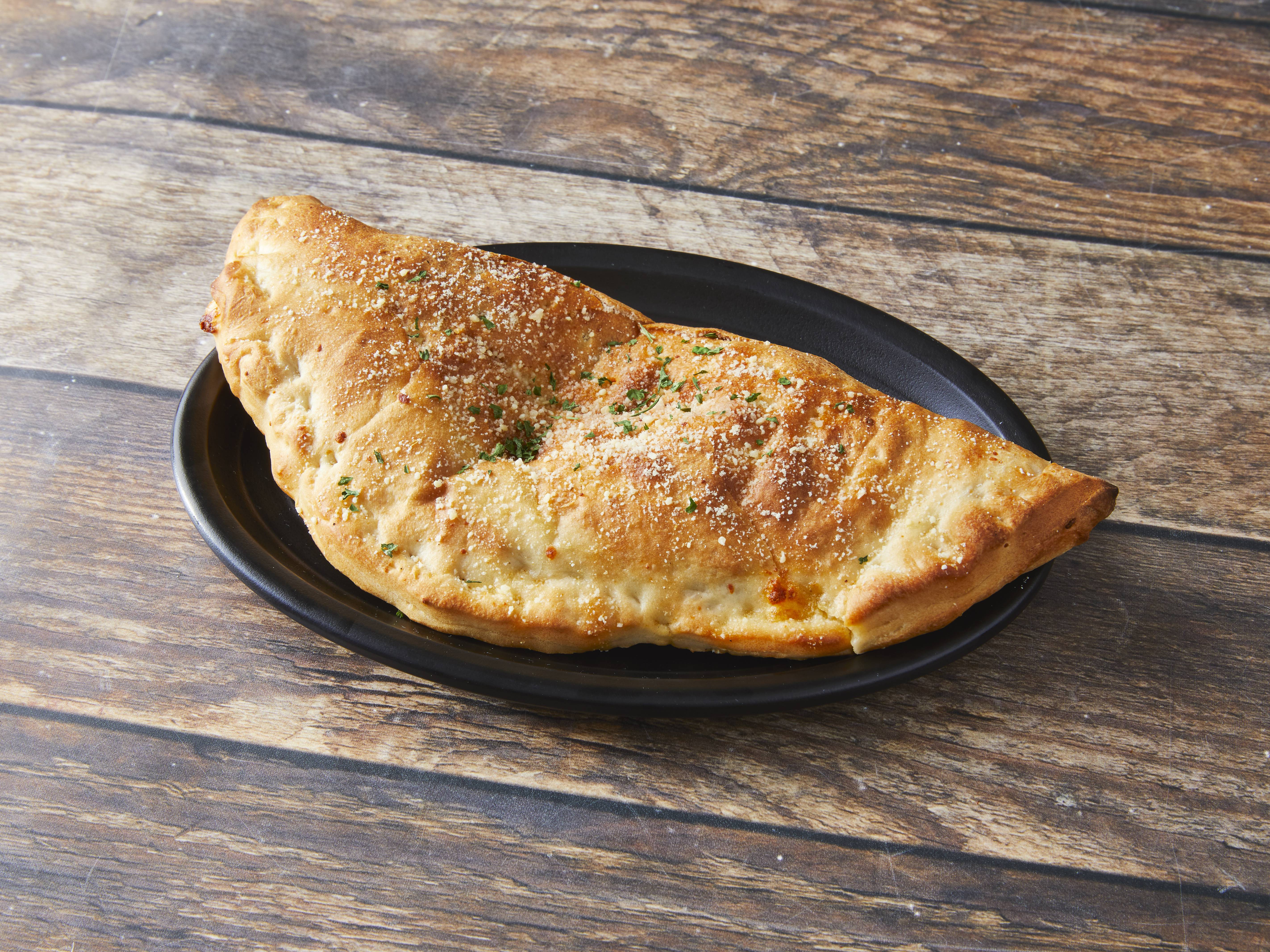 Order Calzone with Cheese food online from Pizza Place store, Detroit on bringmethat.com