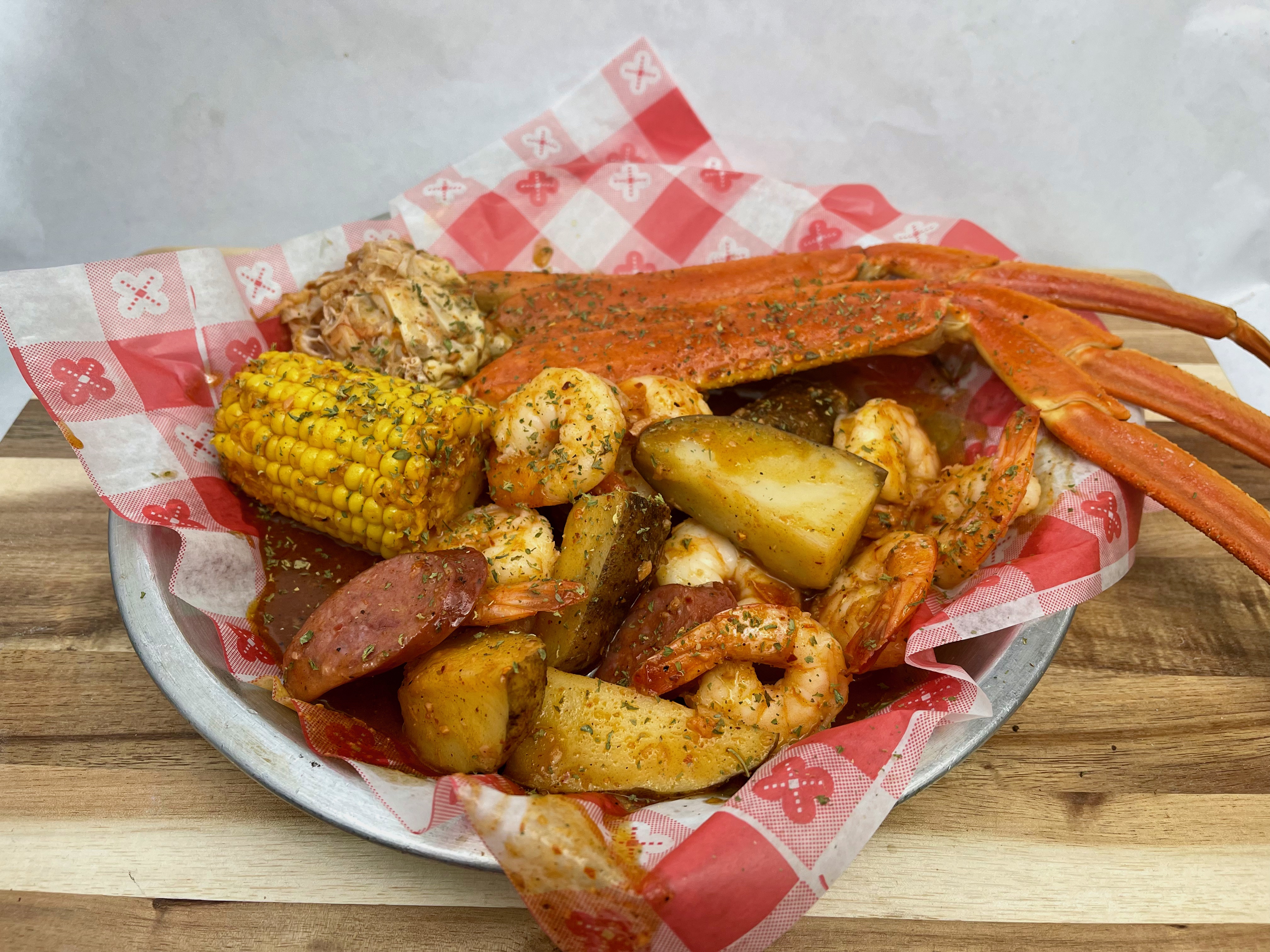 Order One Cluster Combo(1 Cluster Snow Crab, 10 Shrimps Head-Off, 1 Corn, 3 Sausages, & 6 Potatoes) food online from Joyful House store, Saint Louis on bringmethat.com